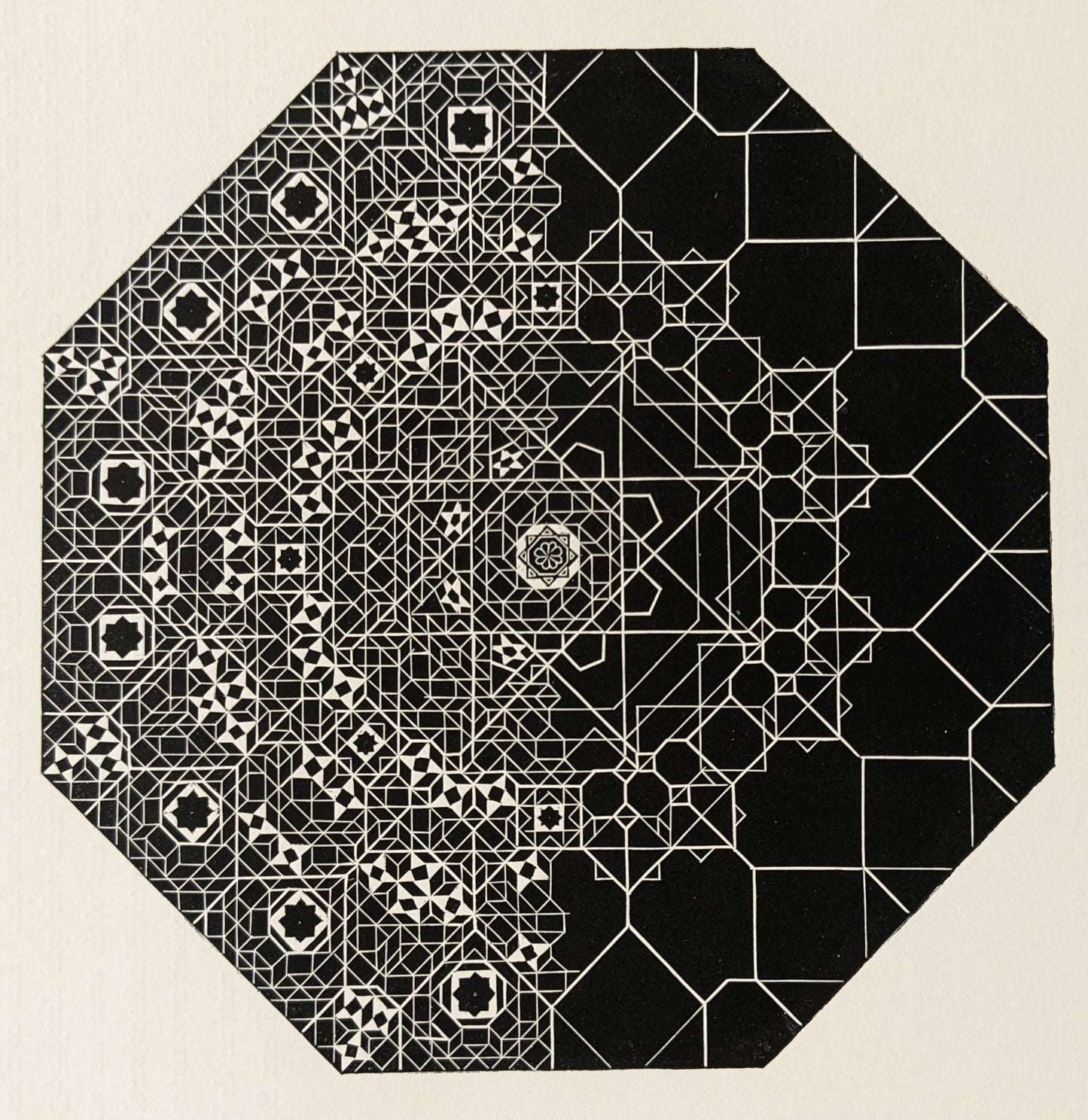 An intricate black and white geometric pattern featuring octagonal and star motifs, radiating outwards symmetrically.