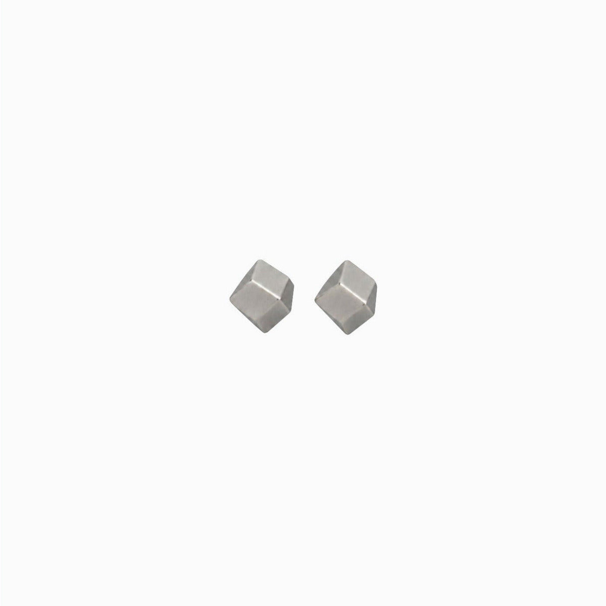 Two metallic geometric stud earrings on a white background