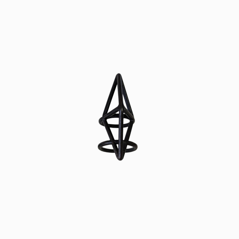 
                  
                    A black geometric ring resembling an abstract pyramid with circular bases, set against a plain white background.
                  
                