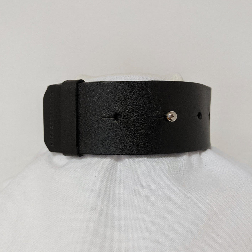 
                  
                    Black leather band with a smooth finish, featuring evenly spaced holes and a silver snap closure. Displayed on a white background.
                  
                