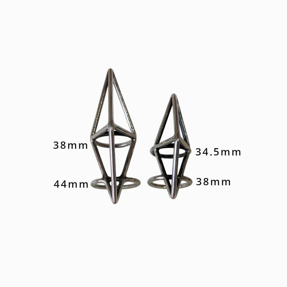 
                  
                    Two silver geometric rings in two sizes, labeled 38mm, 44mm, and 34.5mm, displayed on a neutral background.
                  
                